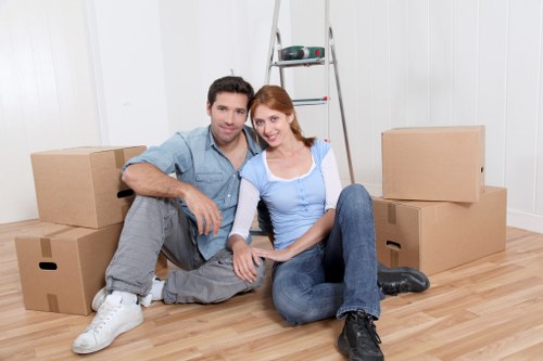 Customer safely moving packed boxes through a storage facility