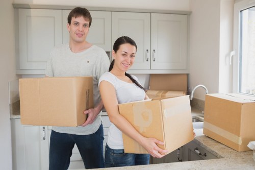 Student packing and moving items into storage in Barnehurst